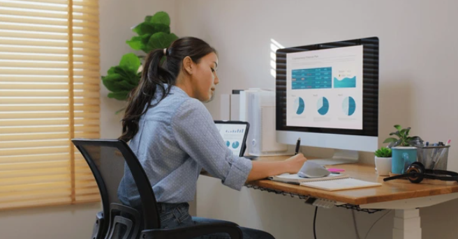 A modern desktop workspace showing SEO analytics dashboards