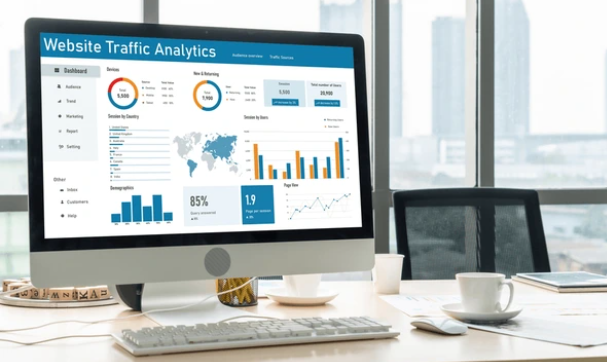 a laptop on a desk surrounded by seo related elements