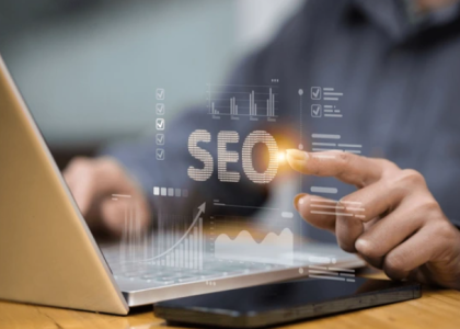 Business owner optimizing a Google Ads campaign on a laptop, with SEO and analytics graphics representing PPC strategy and ROI tracking.