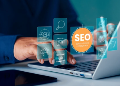 Person working on laptop with SEO icons overlay, representing search engine optimization strategies and digital marketing analysis.